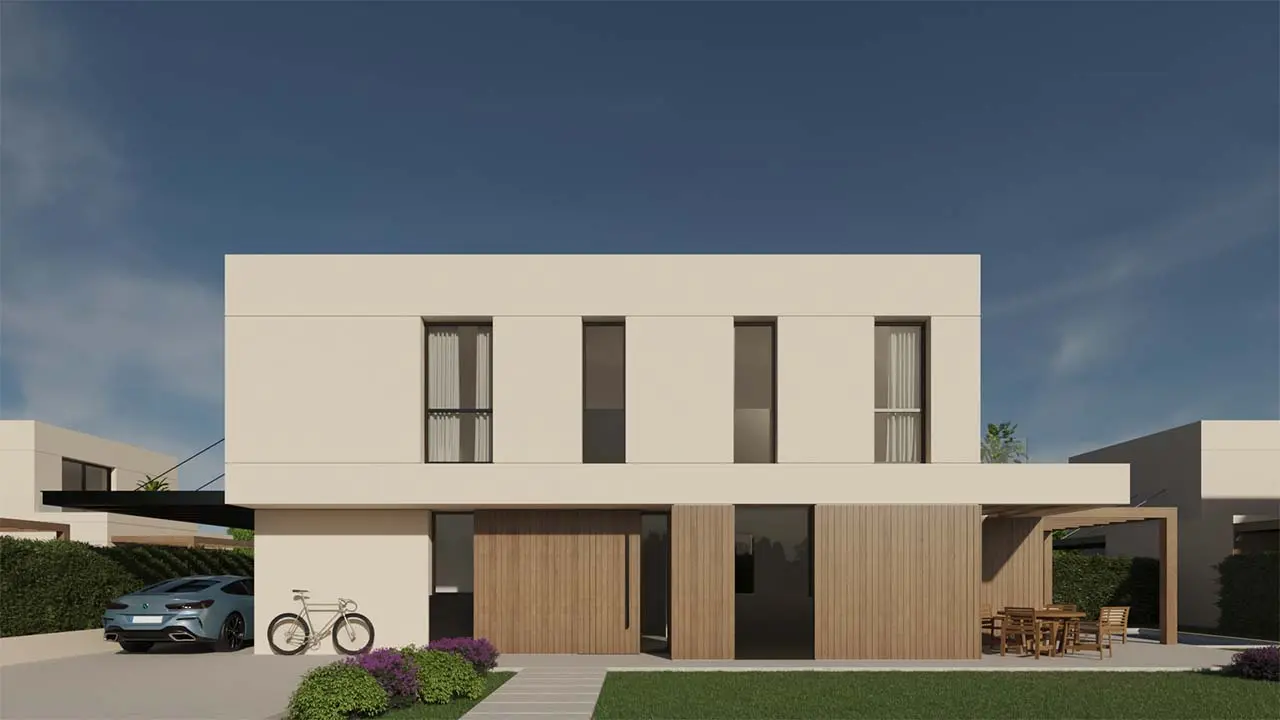 Fachada frontal de uno de los chalets de la urbanización Juana de Vega